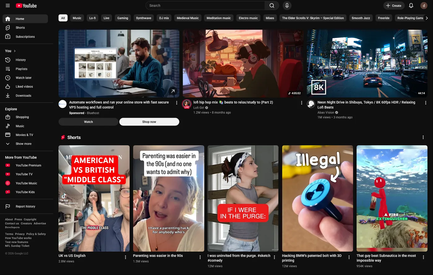YouTube home feed showing a row of vertical Shorts thumbnails interrupting the video grid